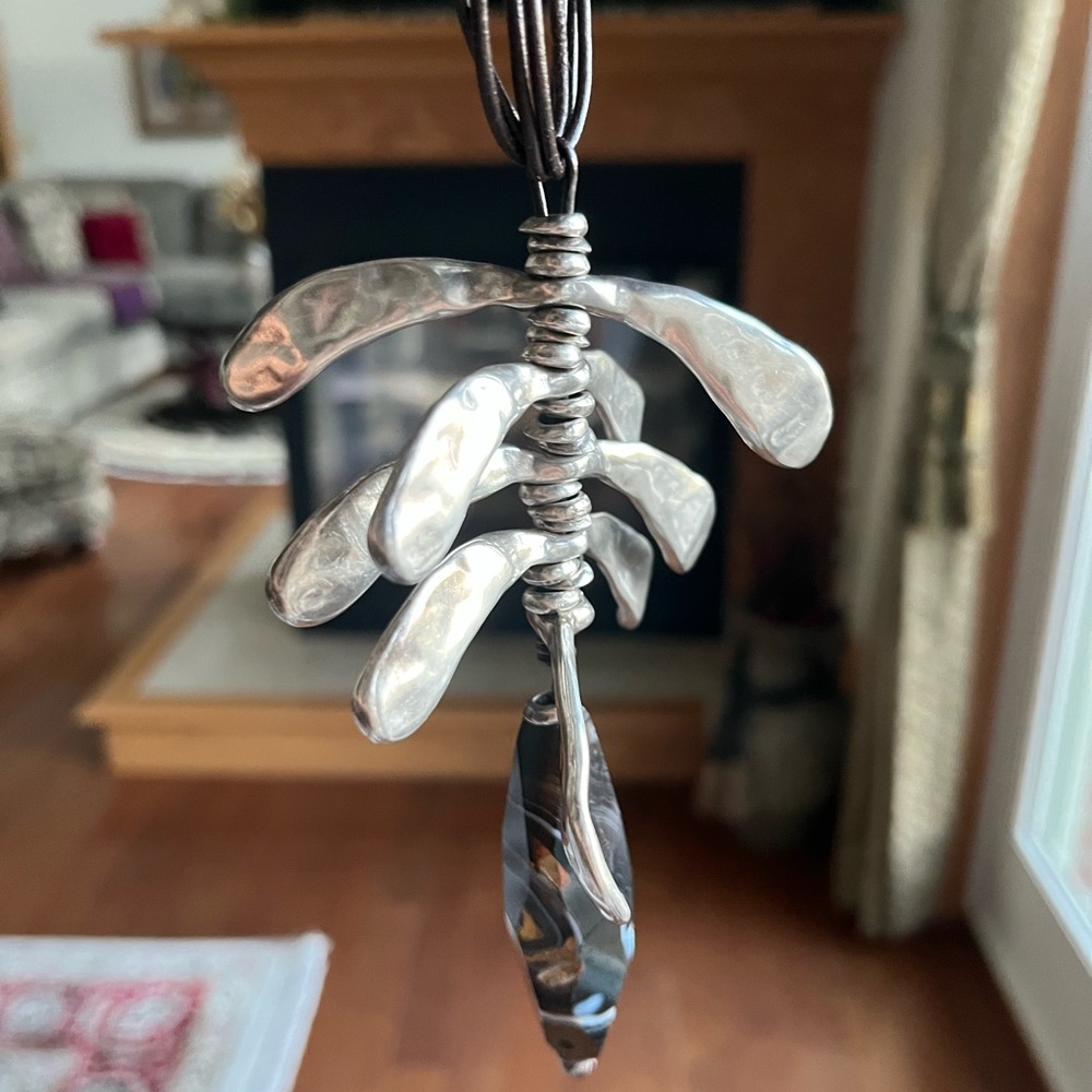 UNO de 50 Silver Necklace with Brown and purple colored stone.